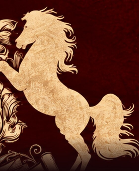 The right-hand horse of the Ashwin crest, rearing, in gold on crimson velvet.